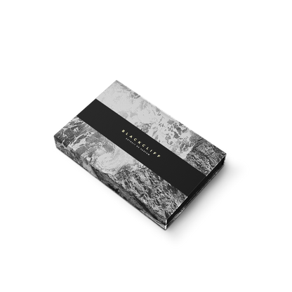 Men's discovery collector set gift box, black/gray marbled pattern.