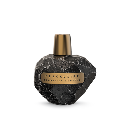 Black perfume bottle with gold cap and gold label reading Blackcliff Beautiful Monster